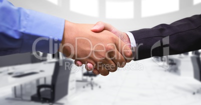 Close-up of handshake in office