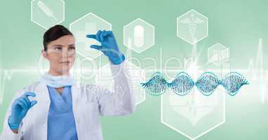 Female doctor gesturing by DNA structure