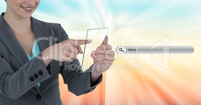 Midsection of businesswoman holding transparent device