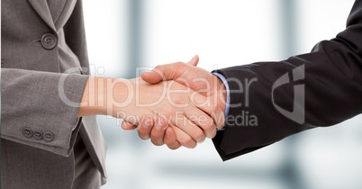 Close-up of business people shaking hands