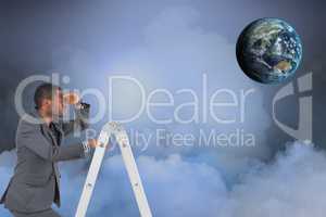 Digital composite image of businessman on ladder looking at globe in sky