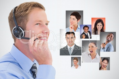 Digital composite image of businessman using headphones by candidates against white background