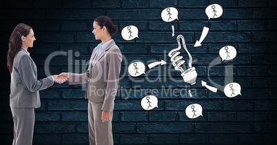 Businesswoman shaking hands by idea icons