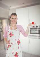 Housewife showing apple