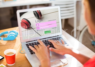 Young woman in the library with laptop and coffe. Login screen