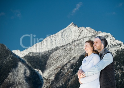 mountain travel, couple in the mountain with snow
