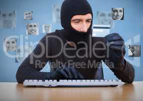 Criminal in hood on laptop with card in front of peoples profile faces