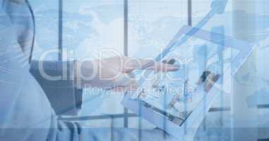 Digital composite image of businesswoman touching digital tablet's screen