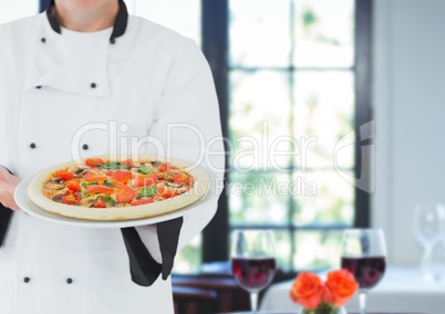 Chef with pizza with table with wine background