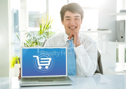 Man with laptop with Shopping trolley icon