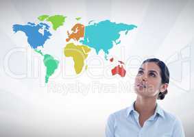 Businesswoman looking at Colorful Map with wall background