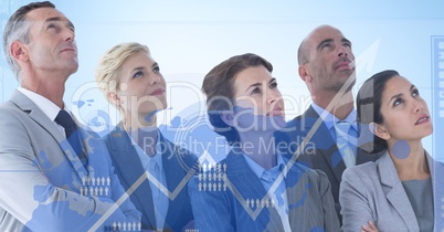 Business colleagues looking away with graph in foreground