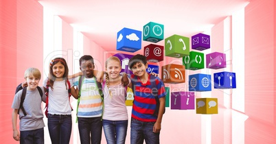 Happy children with arms around standing by app icons