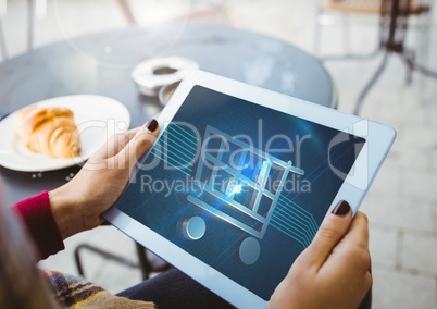 Person using Tablet with Shopping trolley icon