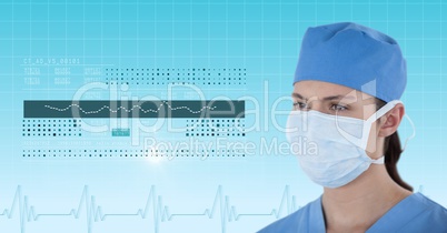 Female surgeon looking at medical graphics