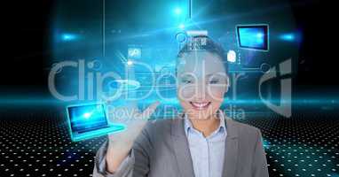 Smiling businesswoman touching virtual screen