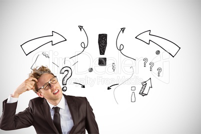 Digital composite image of confused businessman with question marks and arrow symbols in background