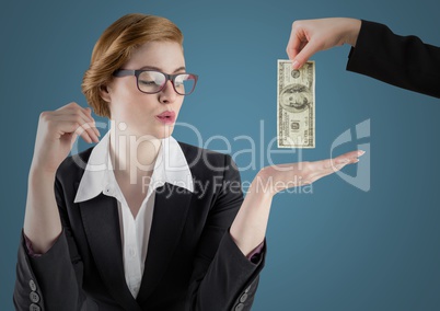 Business woman with hand out and business hand with money against blue background