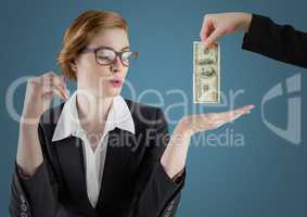 Business woman with hand out and business hand with money against blue background