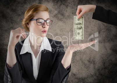 Business woman with hand out and business hand with money against brown grunge background