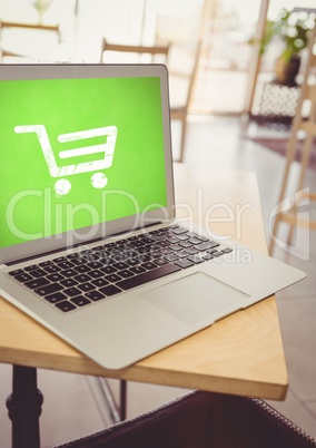 Laptop with Shopping trolley icon