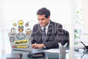 Digitally generated image of businessman using laptop with various icons in office