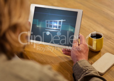 Woman using Tablet with Shopping trolley icon