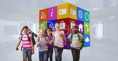 Smiling school children running against apps icons