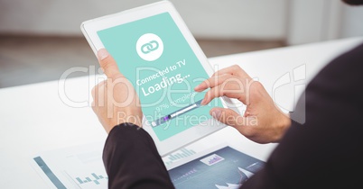 Cropped image of businessman using digital tablet with loading screen