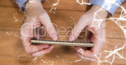 Hands with phone and white network overlay
