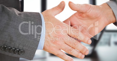 Close-up of handshake in office