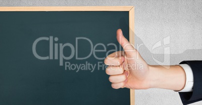 Thumb up green blackboard