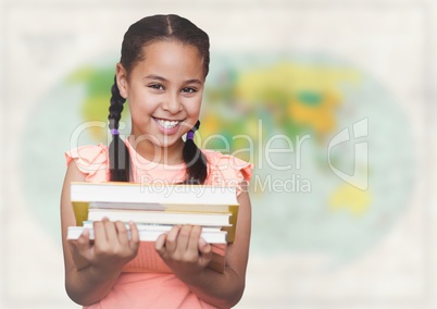 Girl with books against blurry map