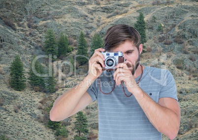 mountain travel, men teiking a photo in the mountains