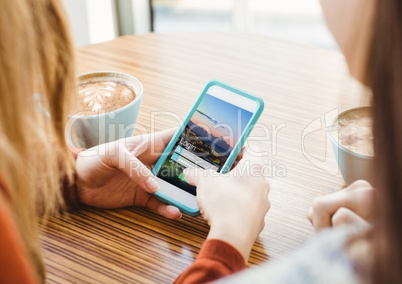 Young woman with phone in a cafeteria. Login screen