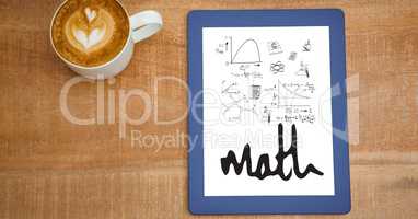 Overhead view of various math equations in digital tablet by coffee cup at table