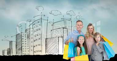 Portrait of family holding shopping bags with buildings in background