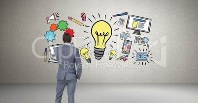 Businessman looking at idea graphics