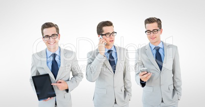 Multiple image of businessman with smart phone and tablet PC