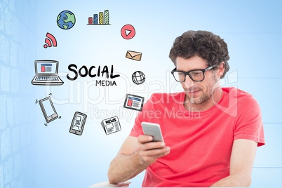 Digitally generated image of man using smart phone by various icons against blue background