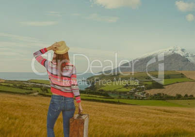 mountain travel,woman with hand bag and hat