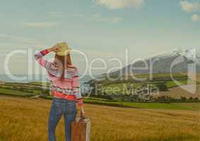 mountain travel,woman with hand bag and hat