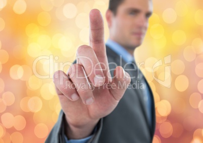 Businessman touching transparent screen