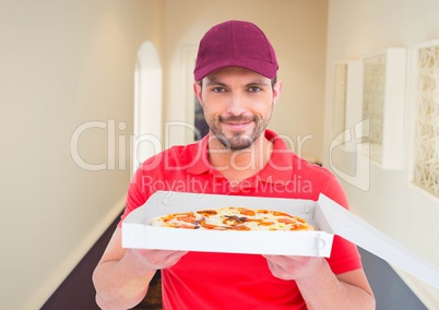 Deliveryman showing the pizza in the corridor of the house