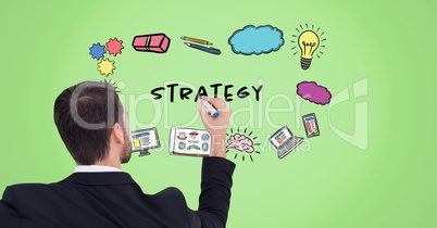 Businessman drawing strategy graphics