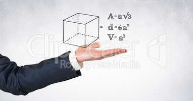 Digital composite image of businessman's hand with formulas and diagram