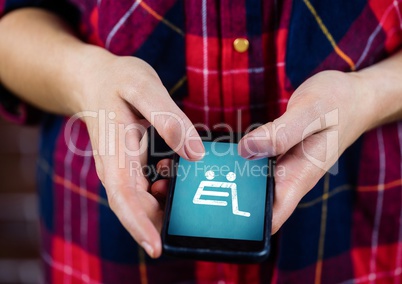 Person using phone with Shopping trolley icon