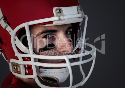 Man in helmet against dark grey background