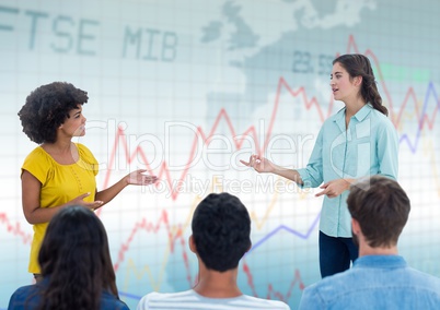 Woman speaking with audience against blue graph