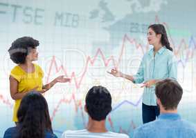 Woman speaking with audience against blue graph